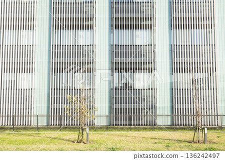 A futuristic office building and a designer modern business building A futuristic office building and a designer modern business building 136242497