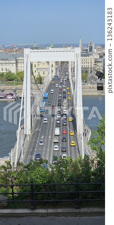 A bridge over a Danube river in Budapest with a lot of traffic A bridge over a Danube river in Budapest with a lot of traffic 136243183