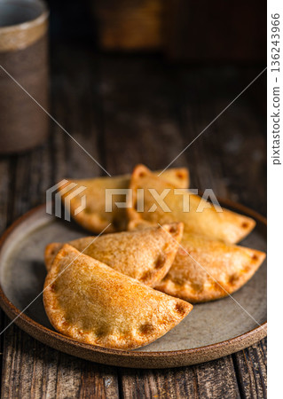 Traditional baked Spanish empanadas Traditional baked Spanish empanadas 136243966