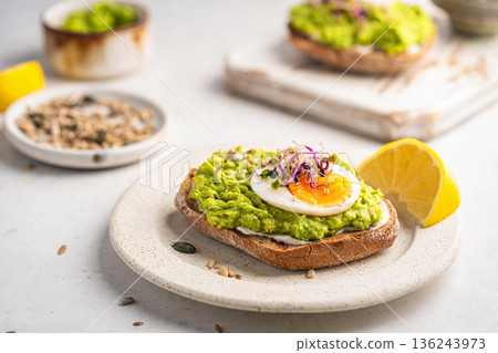 Toast with avocado Toast with avocado 136243973