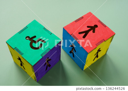 Inclusion concept. Wooden cubes about accessibility and equal opportunity. 136244526