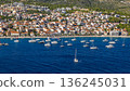 Nautical landscape of Adriatic Sea with sailboats and Croatian seaside architecture aerial view 136245031