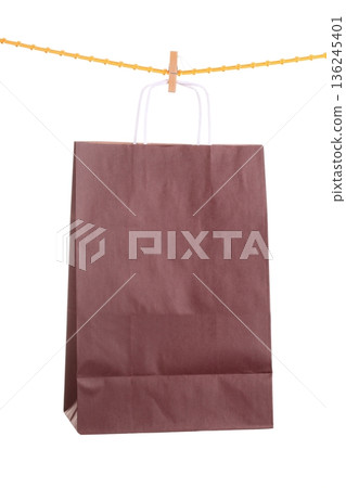 Shopping brown gift bags isolated Shopping brown gift bags isolated 136245401