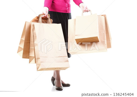 Shopping brown gift bags background 136245404