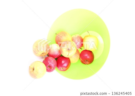 Fresh green, red apples in basket isolated Fresh green, red apples in basket isolated 136245405