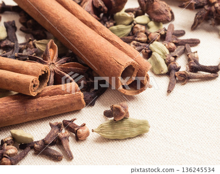 Spices cinnamon sticks anise stars and cloves 136245534