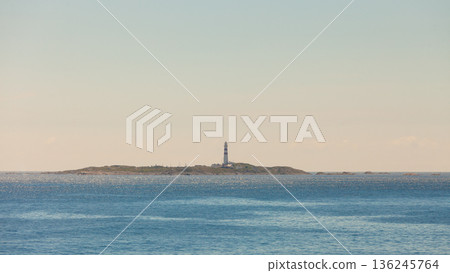 Norwegian coastline with lighthouse 136245764