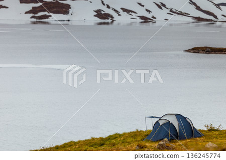 Tent near mountain lake 136245774
