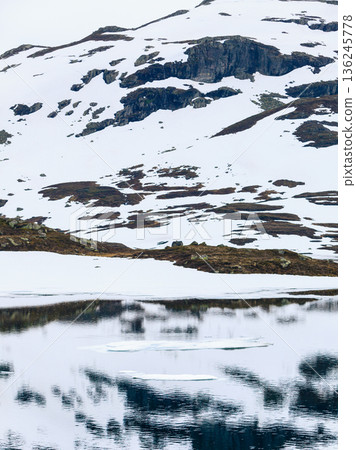 Norway scenic mountains with frozen lake. Norway scenic mountains with frozen lake. 136245778