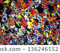 Color spots painted with brush strokes of different sizes. 136246552