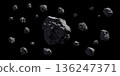 Asteroids or meteorites on black. 136247371