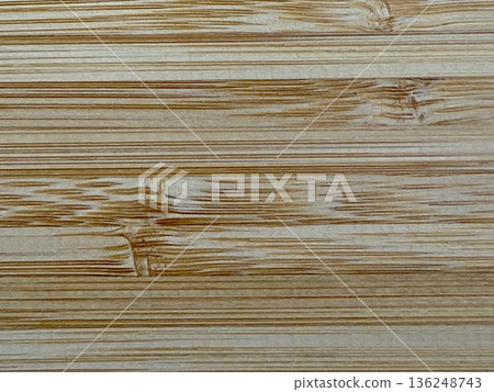 A close-up shot of a wooden board. The textured background is made of natural wood. A close-up shot of a wooden board. The textured background is made of natural wood. 136248743