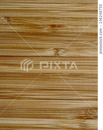A close-up shot of a wooden board. The textured background is made of natural wood. A close-up shot of a wooden board. The textured background is made of natural wood. 136248750