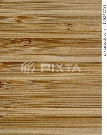 A close-up shot of a wooden board. The textured background is made of natural wood. A close-up shot of a wooden board. The textured background is made of natural wood. 136248751