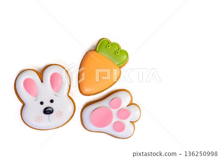 Gingerbread Easter cookies with colorful icing in different shapes 136250998