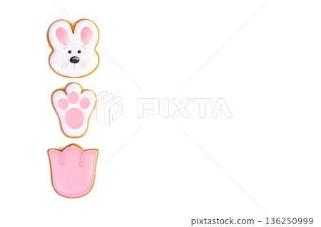 Gingerbread Easter cookies with colorful icing in different shapes 136250999