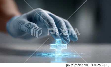 Gloved hand interacting with an illuminated digital cross symbol, representing concepts of healthcare, medical innovation, technological advancement, and future health solutions 136253083