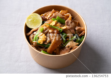 Thai food (Pad See Ew), Stir-fried rice noodles with soy sauce, pork, egg, and kale Thai food (Pad See Ew), Stir-fried rice noodles with soy sauce, pork, egg, and kale 136254753