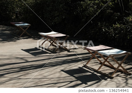 A plaza with benches where you can relax A plaza with benches where you can relax 136254941