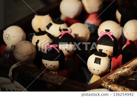 A cute doll made from traditional Japanese crepe paper A cute doll made from traditional Japanese crepe paper 136254942