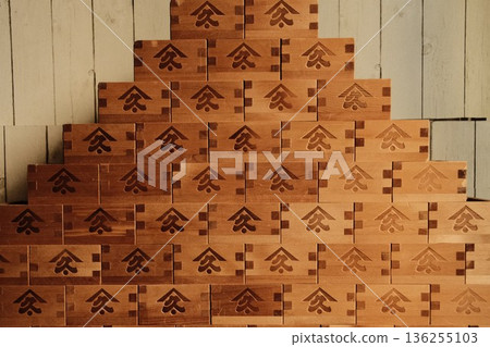 The warm wooden masu wall symbolizes Japanese sake culture The warm wooden masu wall symbolizes Japanese sake culture 136255103