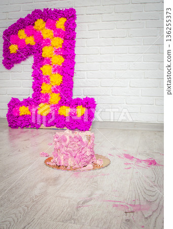 moscow, russia, 31.08.2015 A pink cake with a pink number 1 on it moscow, russia, 31.08.2015 A pink cake with a pink number 1 on it 136255373