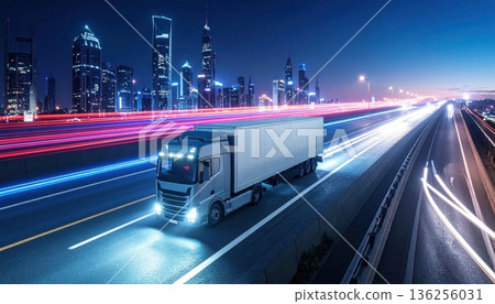 Fast cars drive with blurred motion along the dark urban highway at night, creating a cityscape of light and speed on the busy transport motorway Fast cars drive with blurred motion along the dark urban highway at night, creating a cityscape of light and speed on the busy transport motorway 136256031