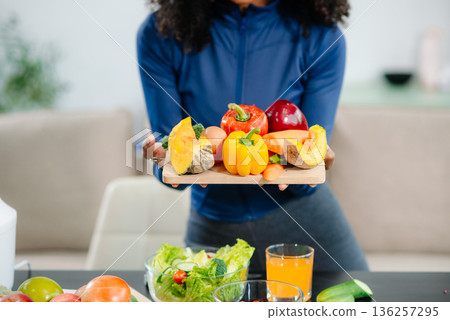 Healthy cooking, featuring fresh fruits, vegetables, and a blender. Perfect for themes of nutrition, wellness Healthy cooking, featuring fresh fruits, vegetables, and a blender. Perfect for themes of nutrition, wellness 136257295