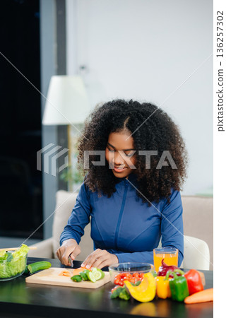 Healthy cooking, featuring fresh fruits, vegetables, and a blender. Perfect for themes of nutrition, wellness 136257302
