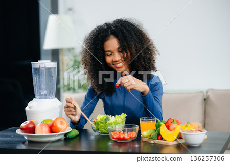 Healthy cooking, featuring fresh fruits, vegetables, and a blender. Perfect for themes of nutrition, wellness 136257306