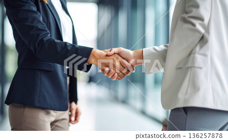 Close Up Business Handshake Agreement Concept 136257878