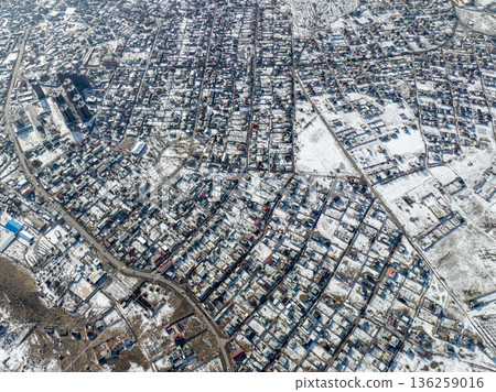 Topdown aerial view of a suburban residential area in winter Topdown aerial view of a suburban residential area in winter 136259016