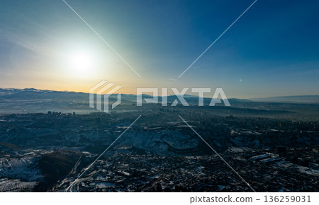 A beautiful blue sky with a sun in the background A beautiful blue sky with a sun in the background 136259031