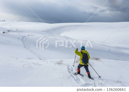Image of snowshoe trekking Snow scene of Tottori Sand Dunes Image of snowshoe trekking Snow scene of Tottori Sand Dunes 136260661