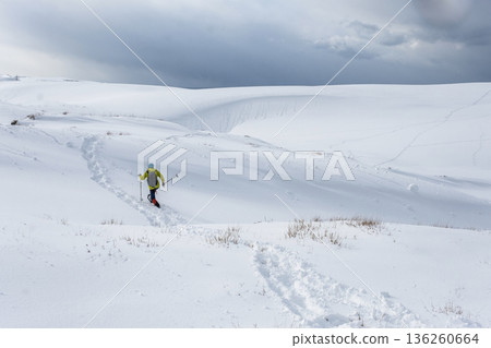 Image of snowshoe trekking Snow scene of Tottori Sand Dunes Image of snowshoe trekking Snow scene of Tottori Sand Dunes 136260664