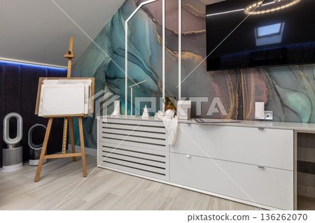 Art Studio Corner with Easel and Abstract Wall Mural 136262070