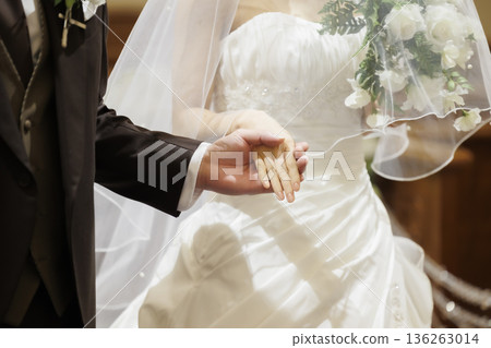 Materials for the bride and groom holding hands at the wedding hall Virgin Road Materials for the bride and groom holding hands at the wedding hall Virgin Road 136263014