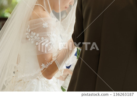 Entrance image image of the bride with her arms crossed Entrance image image of the bride with her arms crossed 136263187
