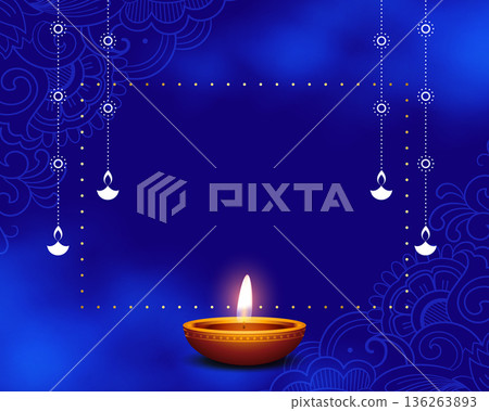 glowing diwali diya on blue background with text space 136263893