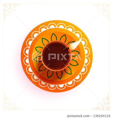 glowing diwali diya on rangoli festive background with copy space 136264128