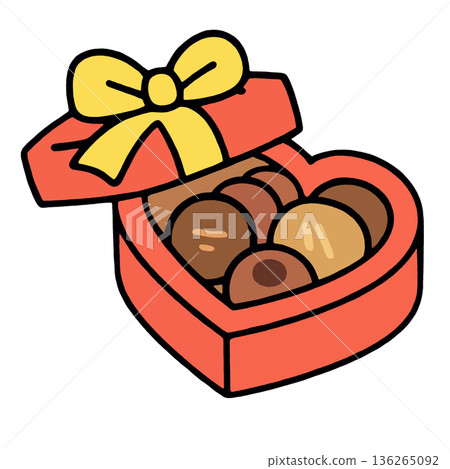 Heart shaped box with yellow ribbon, filled with assorted chocolate candy, romantic gift 136265092