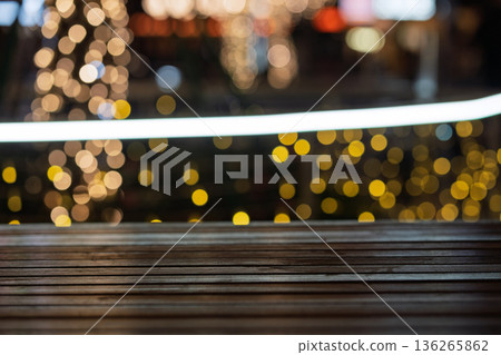 Night bokeh light and wooden table background material Night bokeh light and wooden table background material 136265862