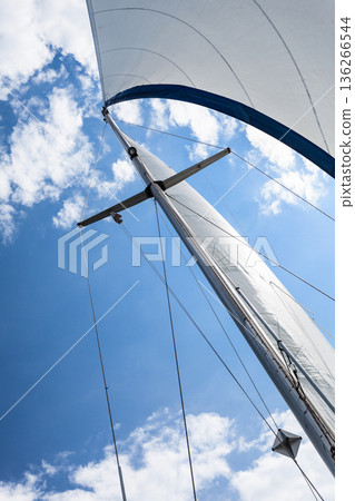 Detailed closeup of sail on sailboat 136266544
