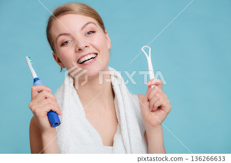 Girl with brush and tongue cleaner. Girl with brush and tongue cleaner. 136266633