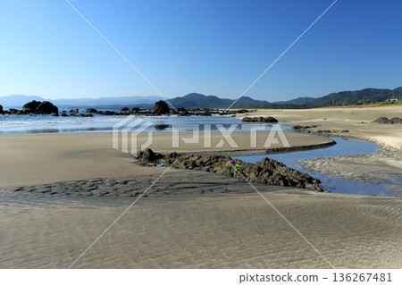 Mirror-like sandy beach 136267481