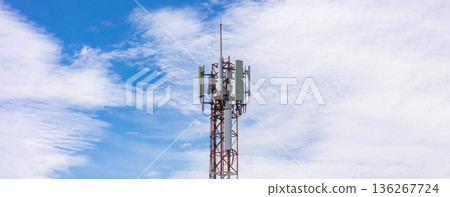 Communication tower top. Radio antenna Tower , microwave antenna tower on light sky background.  136267724