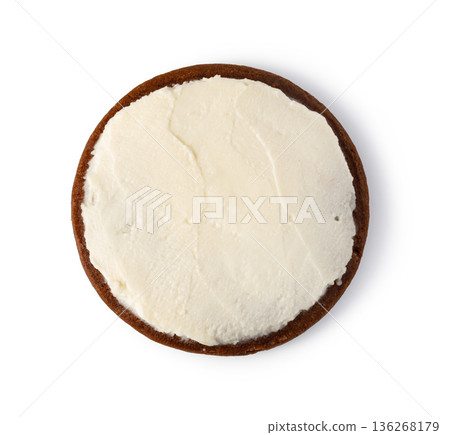 Gingerbread cookie with cream cheese frosting top view Gingerbread cookie with cream cheese frosting top view 136268179