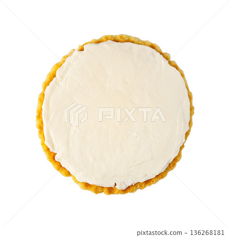 Round cracker with cream cheese spread on white 136268181