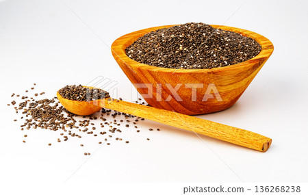Chia seeds in wooden bowl with spoon 136268238