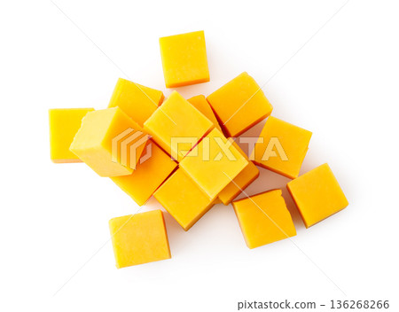 Diced cheddar cheese cubes on white background 136268266